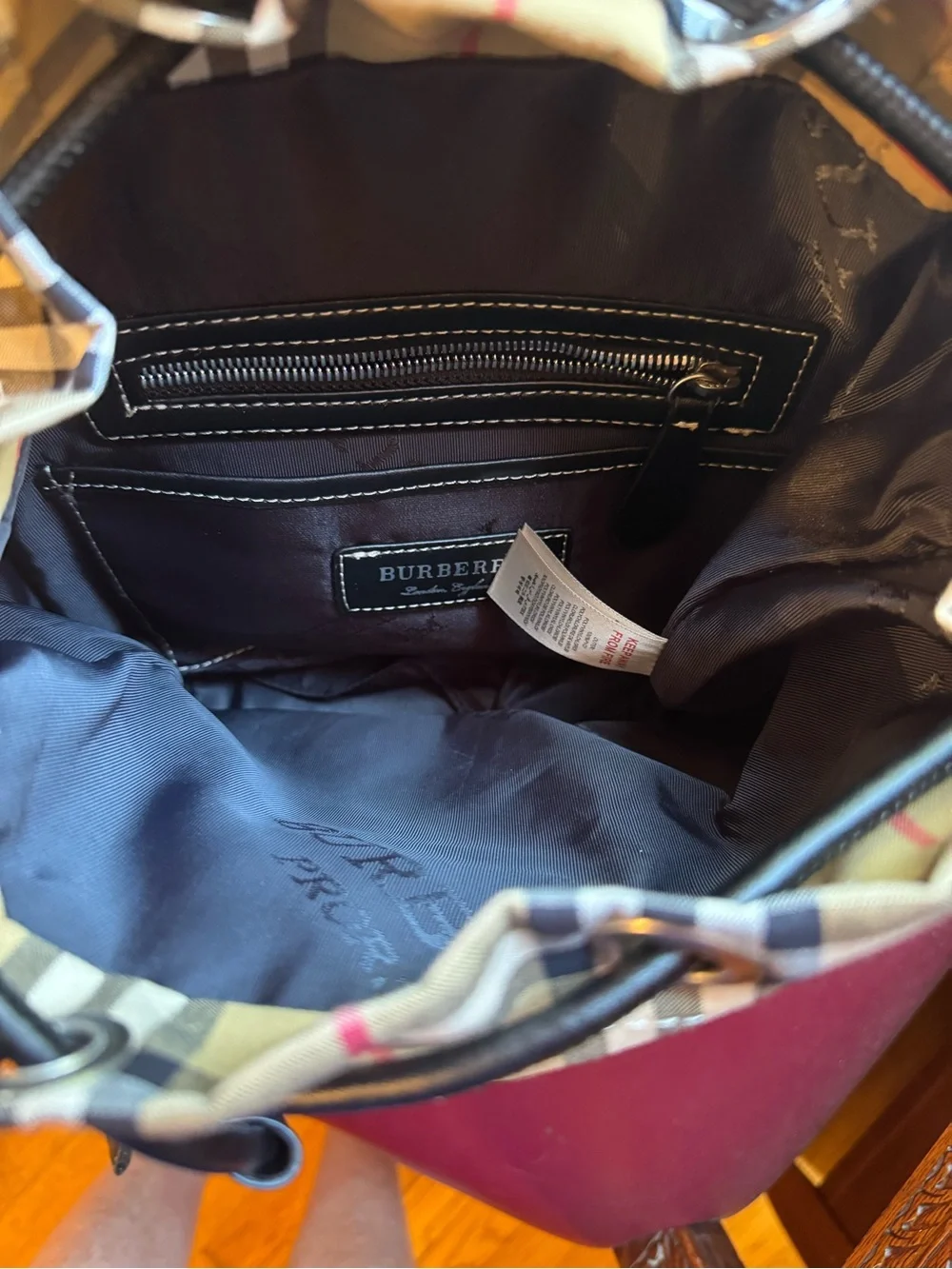 Burberry Nova Check Backpack with black trim and top handle excellent condition